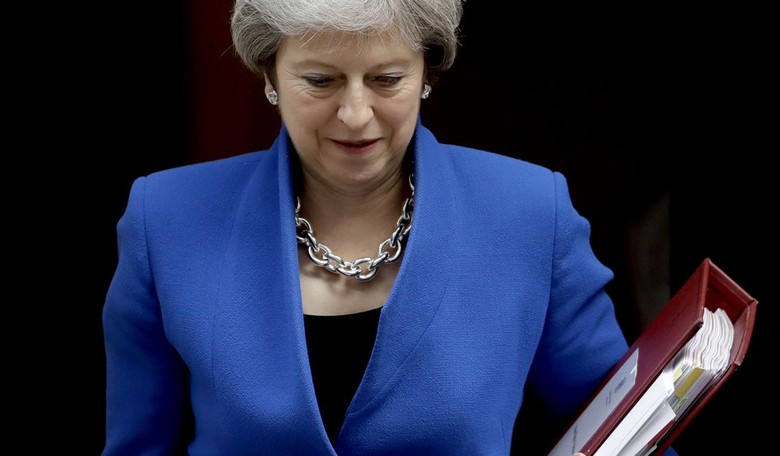 Theresa May Heads Back To EU With Hat In Hand