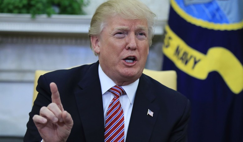  Demoted DOJ Official Didn't Disclose That His Wife Was Paid By Firm That Compiled Trump Dossier