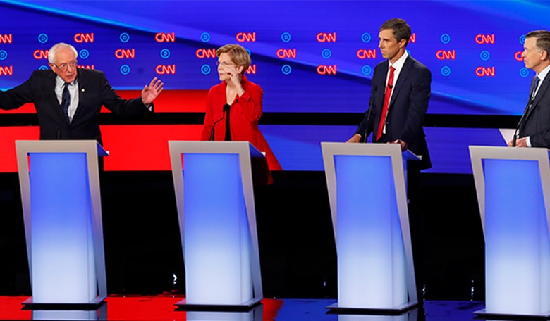 At Debate, Dem Candidates Offer A Non-Choice On Healthcare