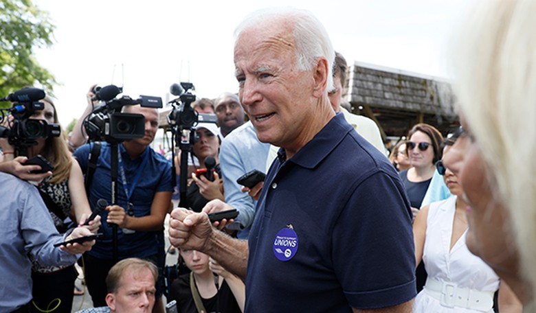 Hands To Yourself: Biden Gets Scolded For Grabbing Woman's Hands Without Her Consent