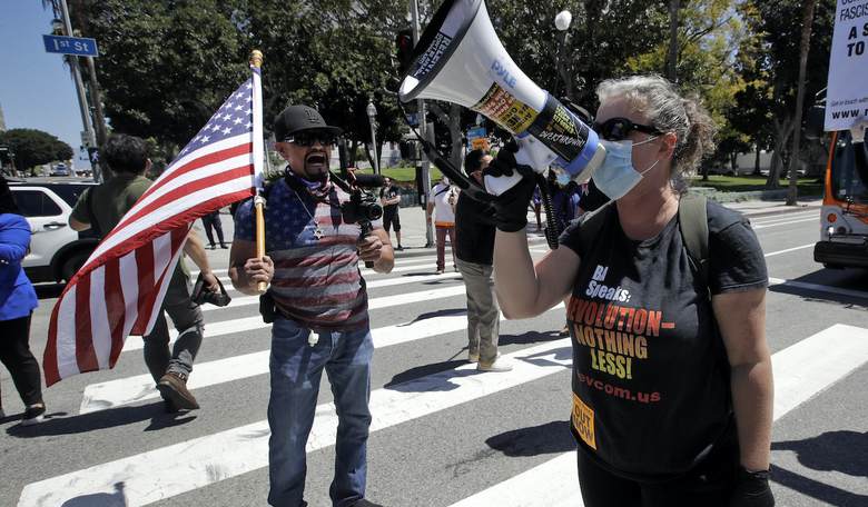Vox: These Anti-Lockdown Protests Are Grounded in White Privilege 