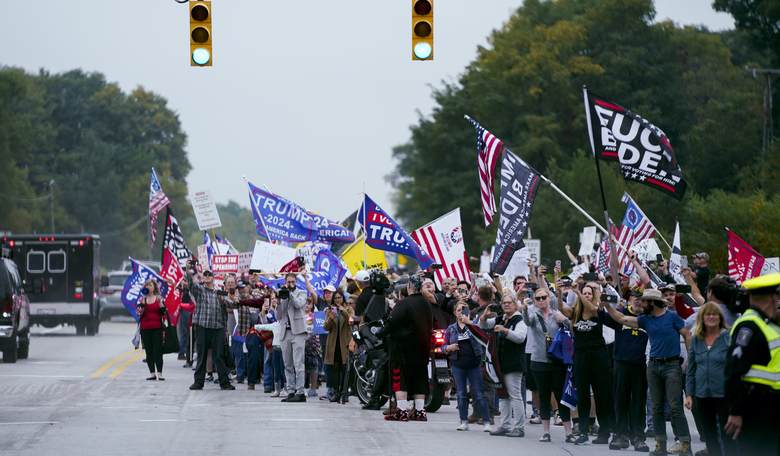 Protesters Welcome Biden to Virginia with Some Very Creative Signs
