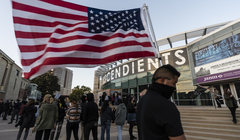 Olympian Activist Faces Away from American Flag During Anthem