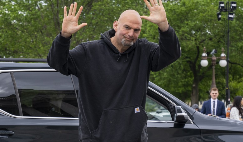John Fetterman Faces Heat After Posting Photo Holding a Controversial Flag