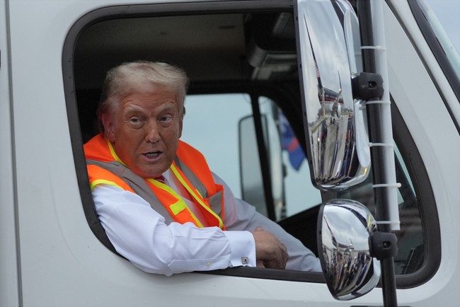 Trump Trolls Dems, Drives in Garbage Truck