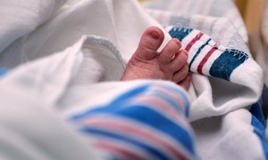 The Backlash Against Massachusetts' Postpartum Home Visit Plan Is Growing