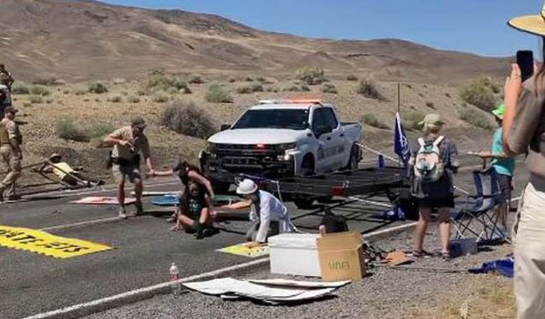 Climate activists do their best to irritate drivers but Nevada tribal police weren't having it