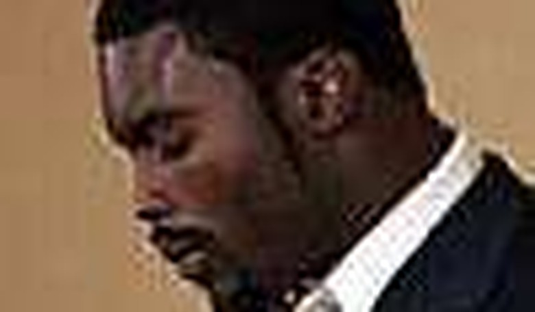Vick Sacked by Prosecutor's Blitz