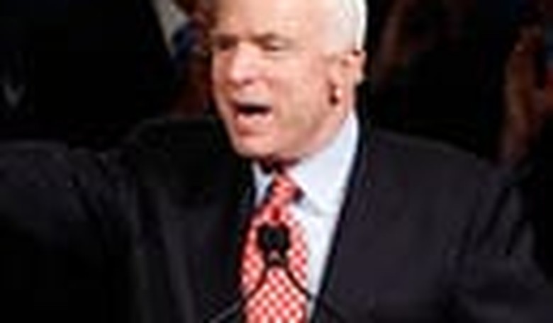 McCain Triumphs, Clinton Wins a Tight Race