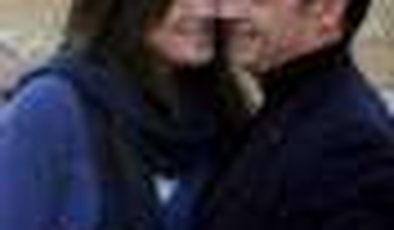 For Love or Country: Sarkozy Surrenders