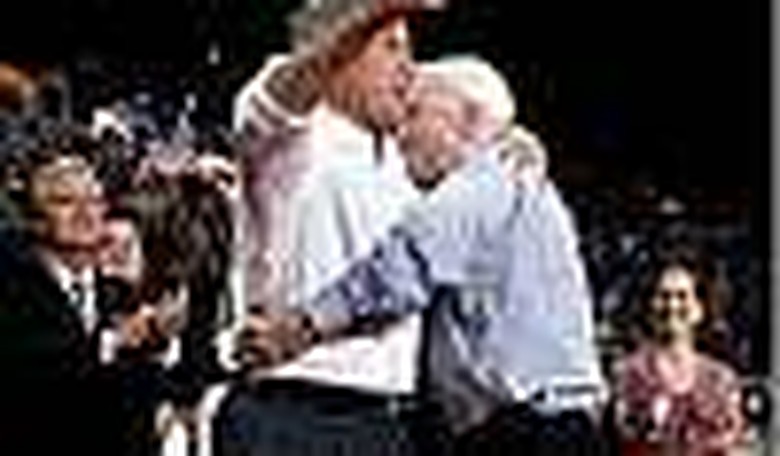 McCain's Delicate Dance Away From Bush