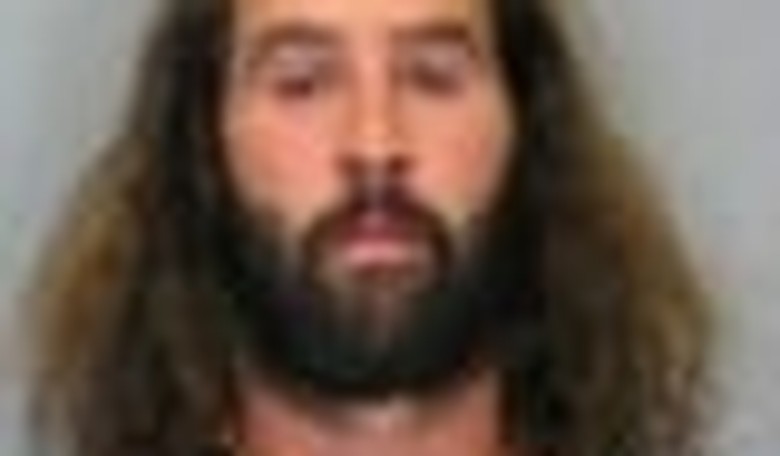 Naked Justice: Arrested for Nudity in His Own Kitchen