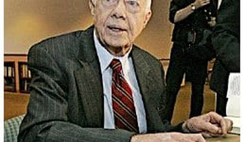 14 Resign Carter Center in Protest