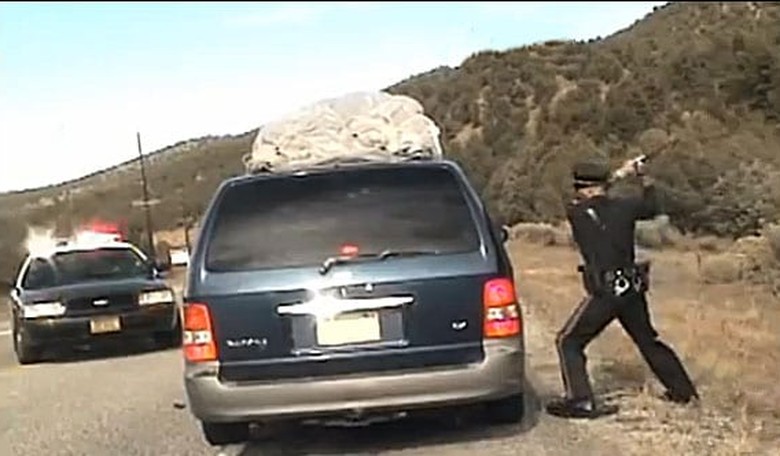 Could Cops on Camera Reduce Police Misconduct?