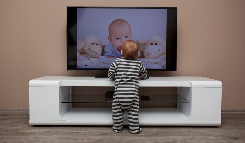 Want More Cuddles? Trade the Tablet for a Book