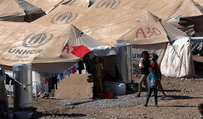 Tens of Thousands of Refugees Stuck in No-Man's-Land on Greek Border with Turkey
