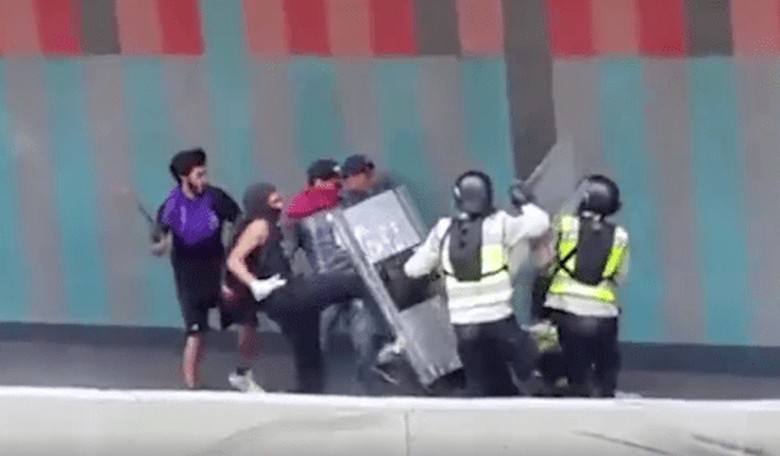 Chaos Erupts in Venezuela: Police Officer Gets Beaten Up