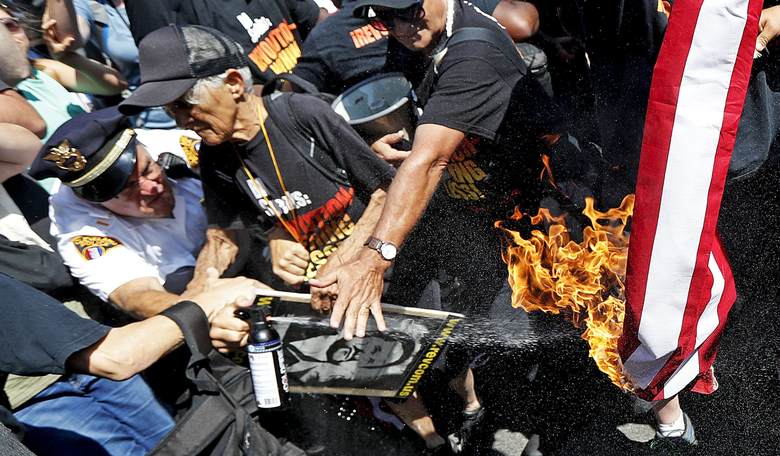 Flag-Burning Commie Protester Accidentally Sets Himself on Fire Outside of RNC