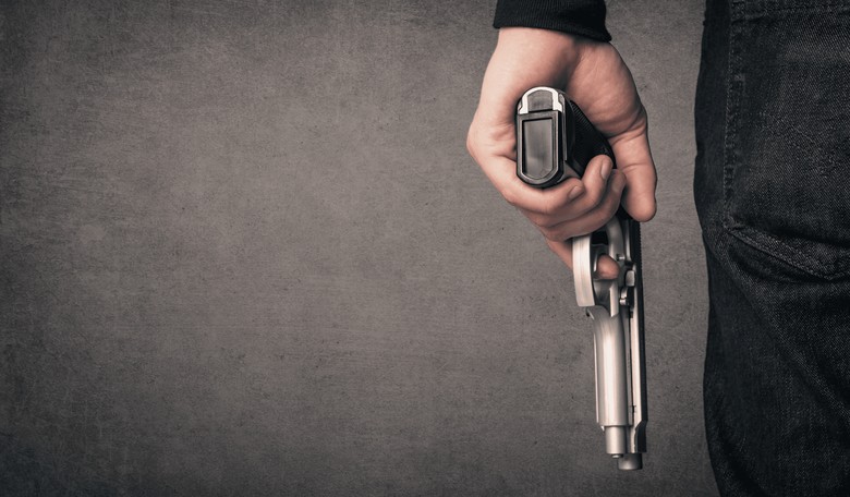 Trump Staffer Sues, Claiming Boss Frequently Brandished Gun and Made Threats