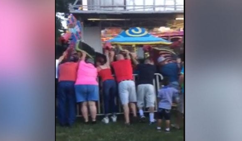 Bystanders at County Fair Rush to Hold Up Collapsed Roller Coaster With Six Children Aboard