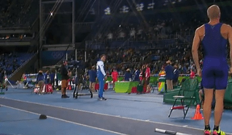 U.S. Pole Vaulter Sam Kendricks Stops Mid-Run, Stands at Attention During the National Anthem