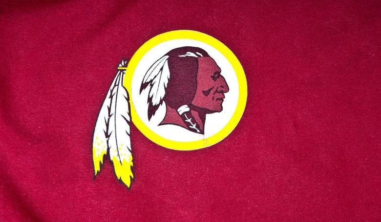 White House Adviser Insults, Assaults Native American for Wearing Redskins Sweater
