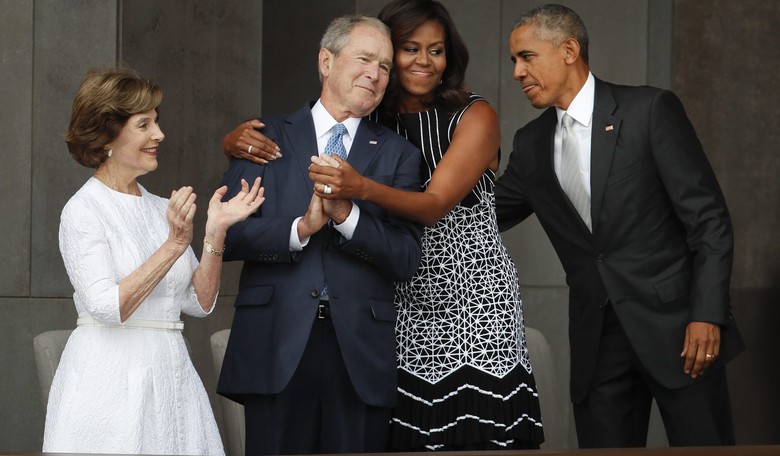 'Deadspin' Wants You to Know that Michelle Obama and George W. Bush Did Not 'Lovingly Embrace'