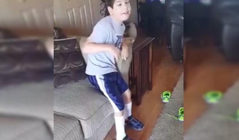 9-Year-Old with Cerebral Palsy Gives It His All to Stand for Our National Anthem