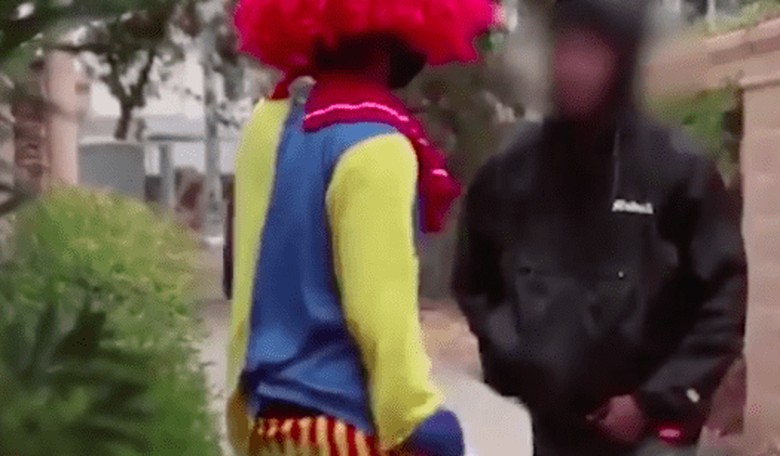 Creepy Clown Gets Pistol Whipped