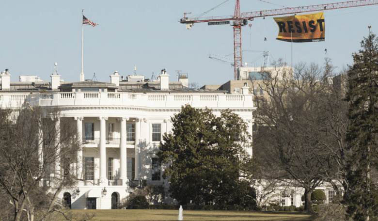 Greenpeace Activists Hang 'Resist' Sign Over White House