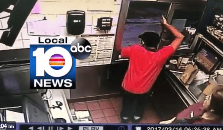 Watch a McDonald's Employee Jump Out the Drive-Thru Window to Help a Customer