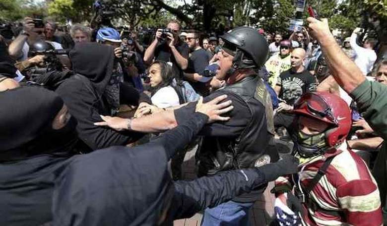 Black-Clad, Masked Thugs Attack Pro-Trump Protesters