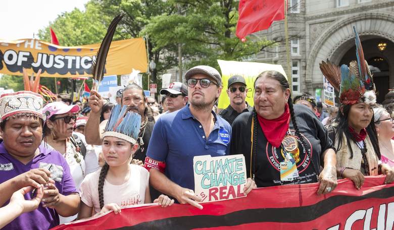 DiCaprio Flies Commercial to D.C. Climate March, Rides in Tesla