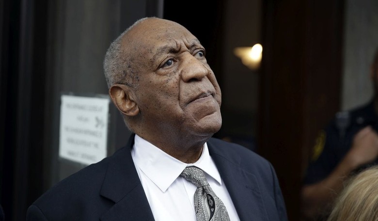 Bill Cosby's Second Trial Kicks Off With Topless Woman Trying to Confront Him