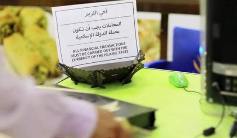 ISIS Rolls Out New Pennies, Bans Use of 'Satanic' U.S. Dollars