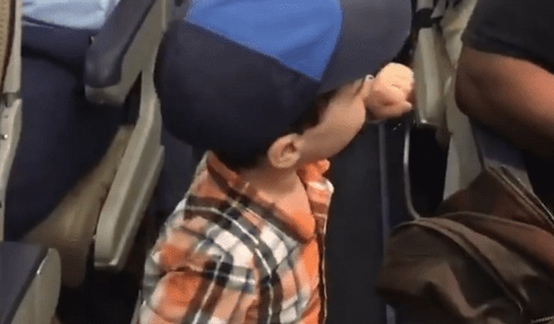 Two-Year-Old Fist Bumps His Way to His Seat on a Plane