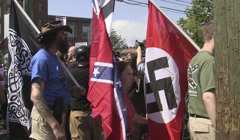 Trump Signs Unanimous Resolution Calling on White House to Battle White Supremacists