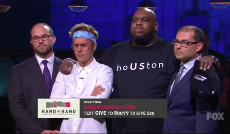 Justin Bieber Prays at Hurricane Benefit Concert