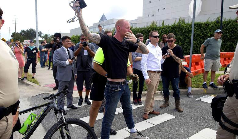 3 Spencer Supporters Charged with Attempted Murder in Post-Speech Shooting