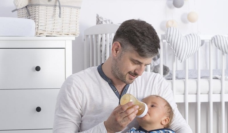 Feminists Warn: Images of Fathers Bottle-Feeding Babies Threaten Breastfeeding Moms