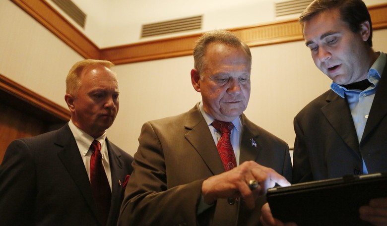 Moore Alleges Fraud in Jones Win, Tries to Block Certification