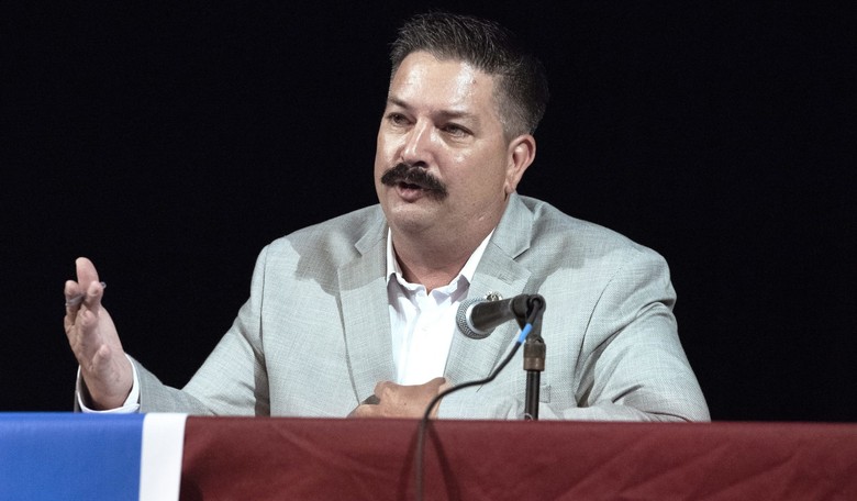 Blasts from Past Trim ‘Iron Stache’ Campaign Hopes; Democratic Opponent, Republicans Rejoice
