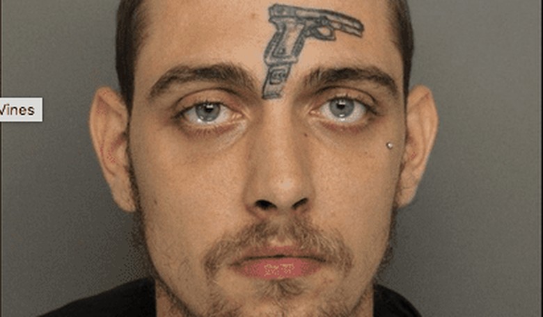 Man with Gun Tattooed on His Forehead Arrested for Possessing a Firearm