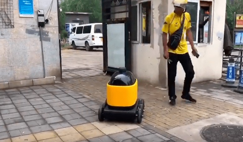 Beijing's 'Little Yellow Horse' Robots Deliver Essentials as Amazon Drones Languish in U.S.