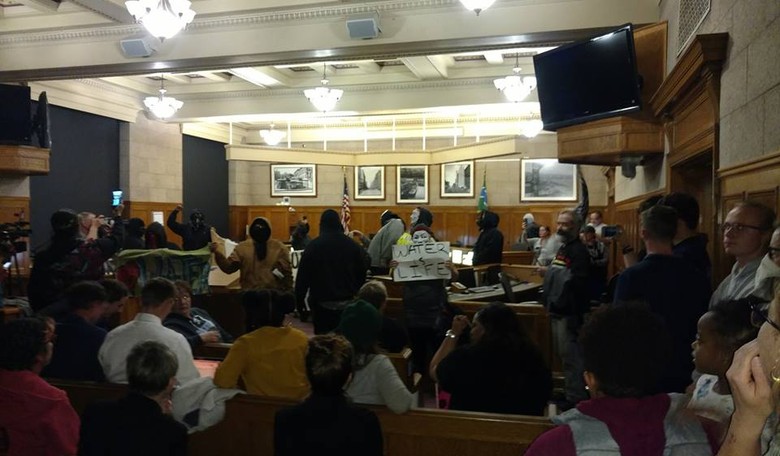 Masked Demonstrators Temporarily Shut Down Duluth City Council Meeting Over Protective Gear for Cops