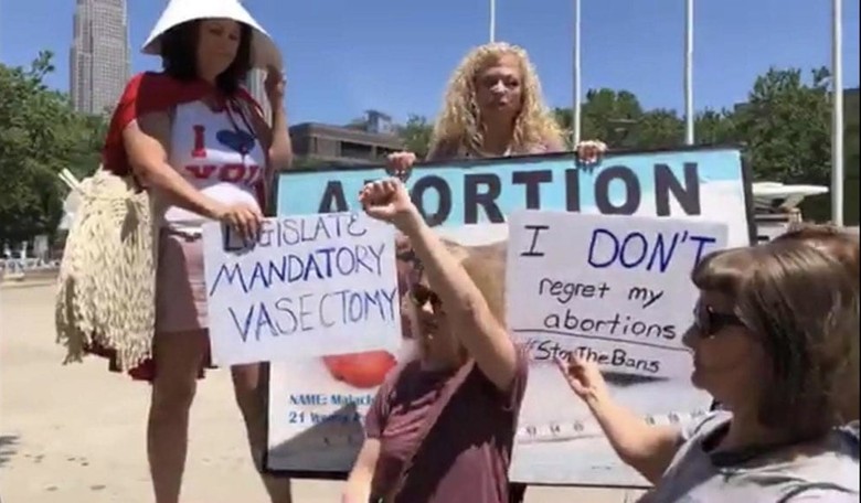 Video: Activist Mommy Crashes Abortion Rally, Confronts Protesters with Graphic Photos of Aborted Babies