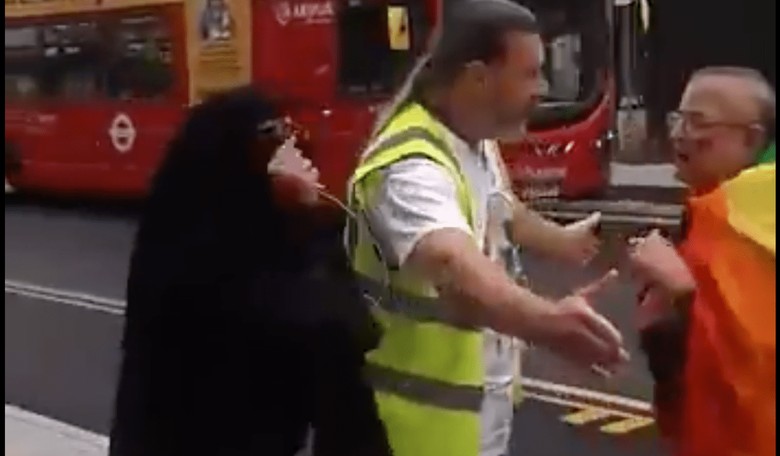 Who Will Liberals Back? Veiled Muslim Woman Goes at It With LGBT Rainbow Flag Marcher