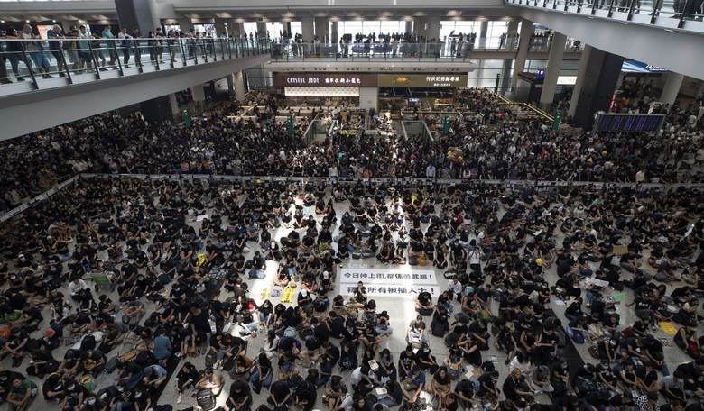 Hong Kong Cancels All Flights Out of Airport as Protesters Stage Massive Sit-In