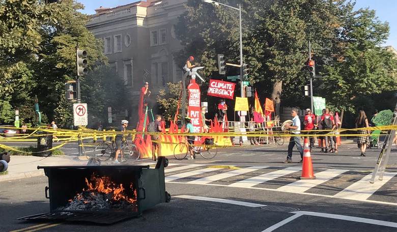 'Shut Down DC' Climate Protesters Start a Dumpster Fire