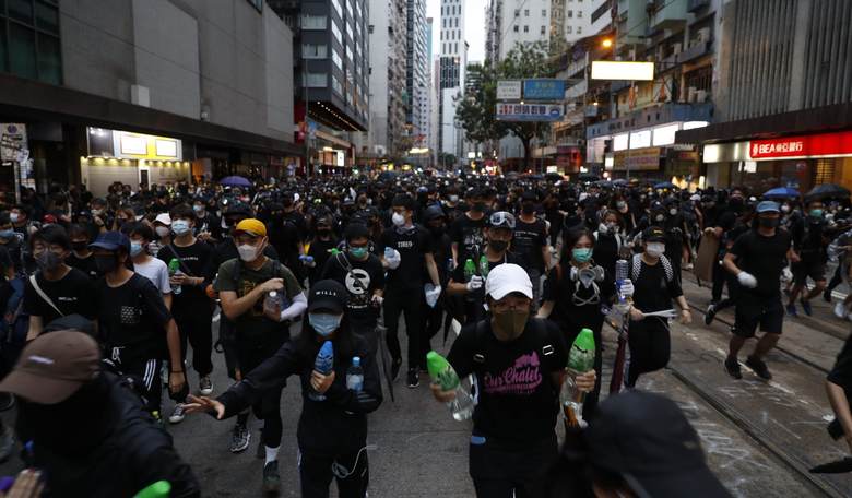 Police Arrest 14 Pro-Democracy Protesters in Hong Kong